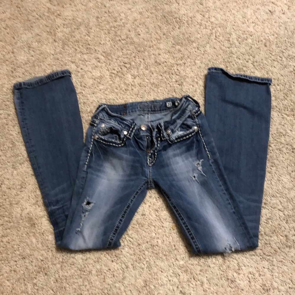 Boot cut Miss me ripped blue jeans